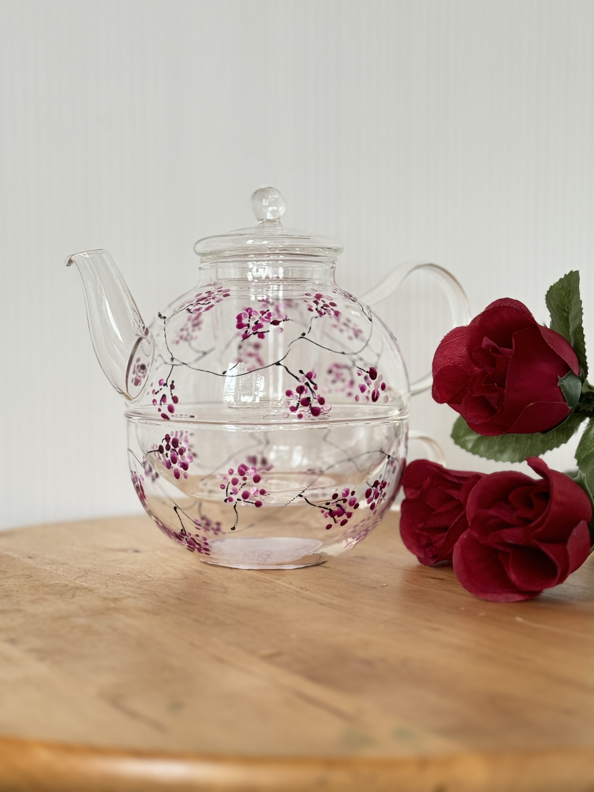 Delicate hand-painted teapot set with blossom design